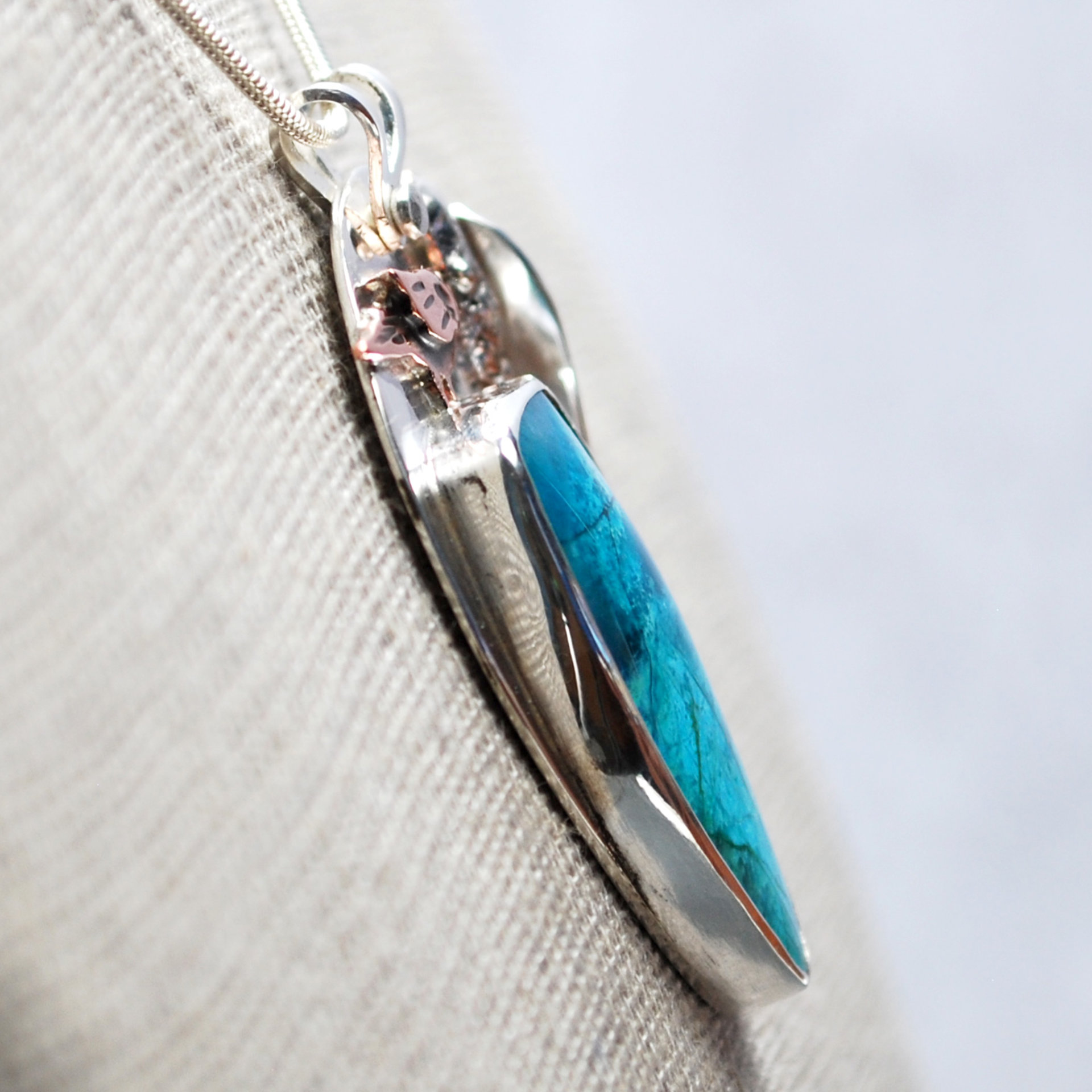 Chrysocolla Pendant with Bird and Cattail close-up angle
