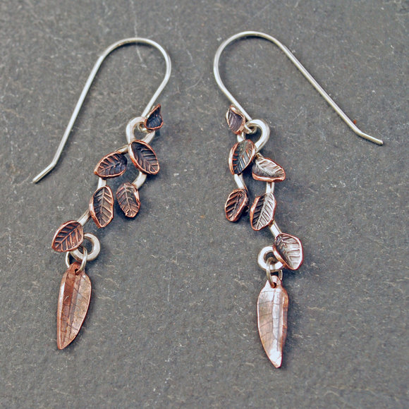 Silver and copper stamped and impressed leafy earrings