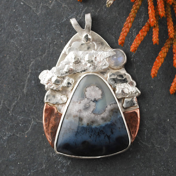 Silver pendant with agate, copper hills and layers of silver clouds (some riveted)