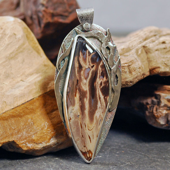 "Hold on to Hope" pendant: Fossilized Palm Root, silver smoke tendrils