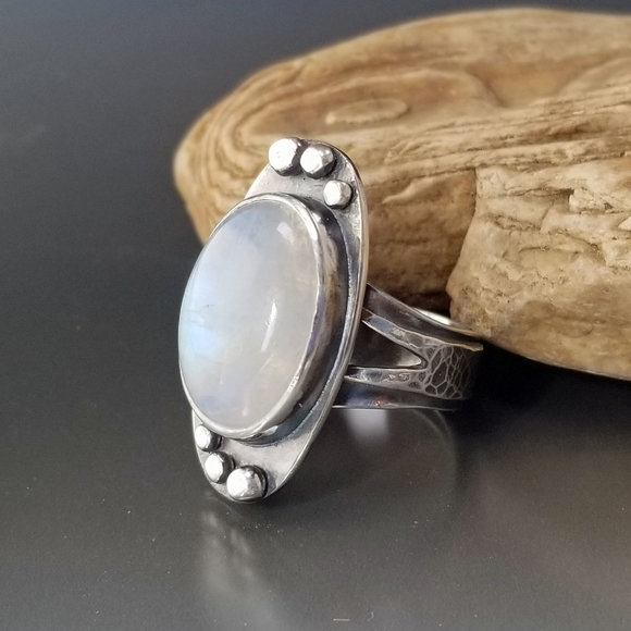 Custom ring: Moonstone with hammered silver disks and layered band