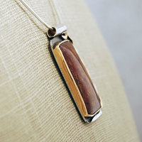 Silver and 14K Gold Pietersite Pendant close-up side view