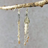 Silver Cloud Earrings with Rain, Lightning hanging, angle view