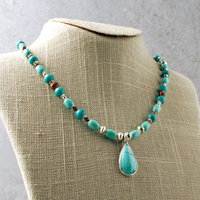 Nacozari Turquoise, Silver, Copper Necklace hanging at angle