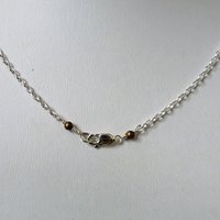 Hammered Bronze Bar Necklace with Happy Silver Fish and Blue Topaz