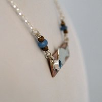 Hammered Bronze Bar Necklace with Happy Silver Fish and Blue Topaz