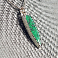 Silver Pendant with Maw Sit Sit