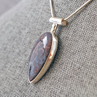 Agate Pendant with Rose Cut-Out in Back, angle