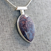 Agate Pendant with Rose Cut-Out in Back, angle