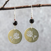 Silver Rose cut-out garnet earrings, hanging back view