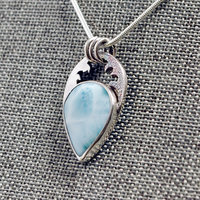 Larimar silver pendant slight angled view