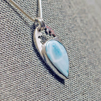 Larimar silver pendant angled view