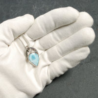 Larimar silver pendant in hand
