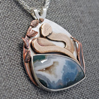 Snake pendant angled view - Agate with druzy and bronze snake above it