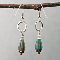 Silver ring and Czech glass teal earrings hanging-back view