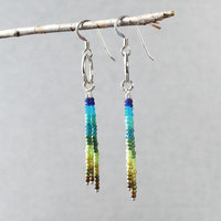 Silver earrings with blue and green dangles