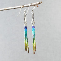 Silver earrings with blue and green dangles