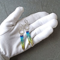 Silver earrings with blue and green dangles