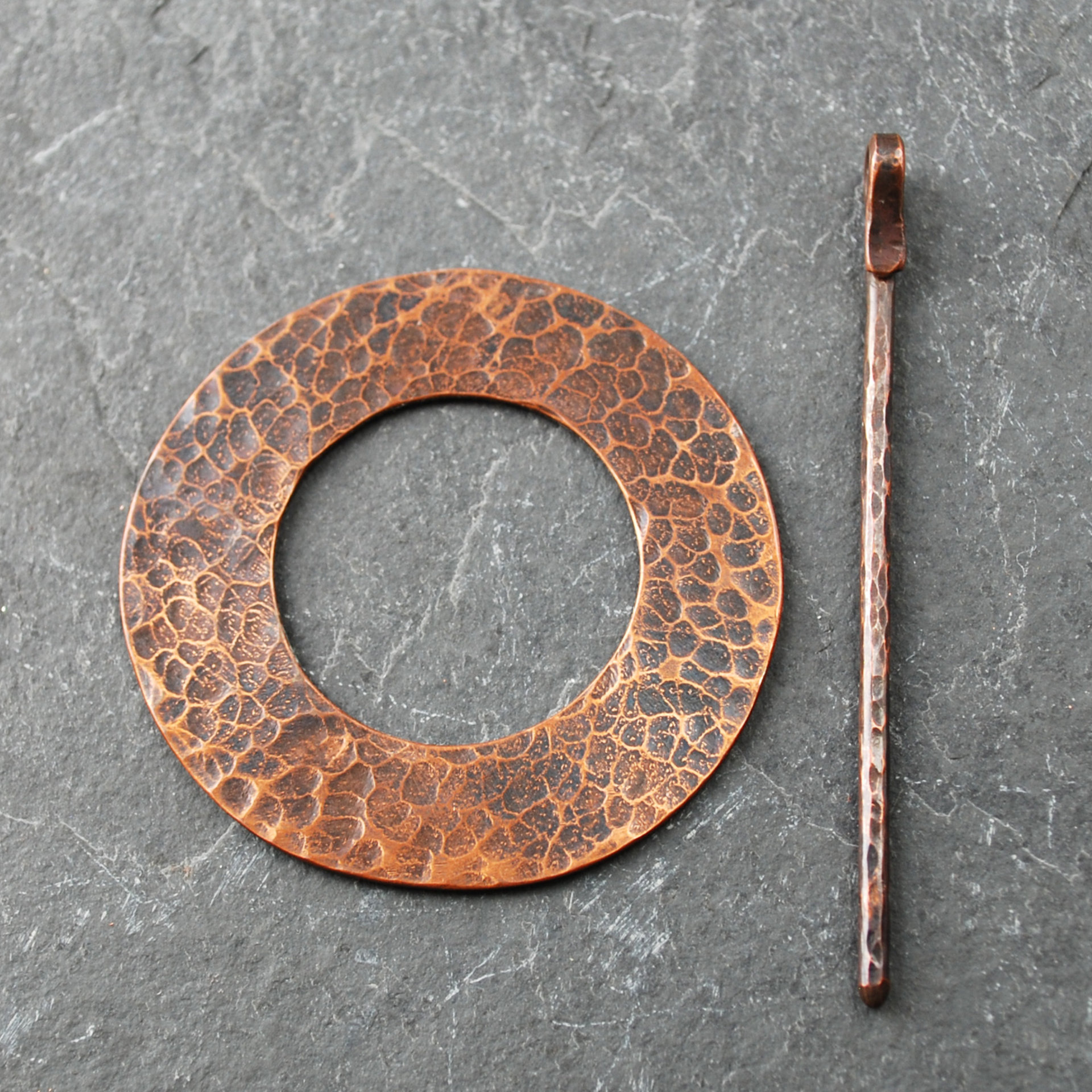Rustic Hammered Copper Shawl Pin on scarf front