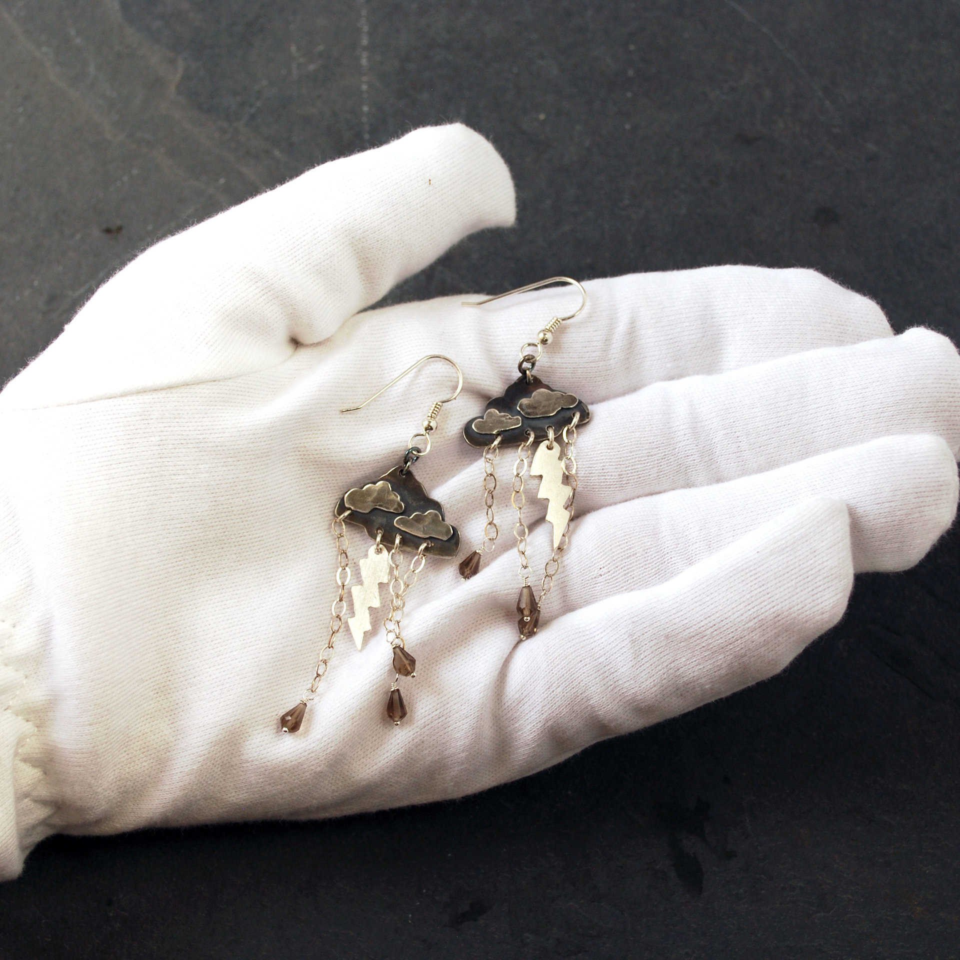 Silver Cloud Earrings with Rain, Lightning in hand