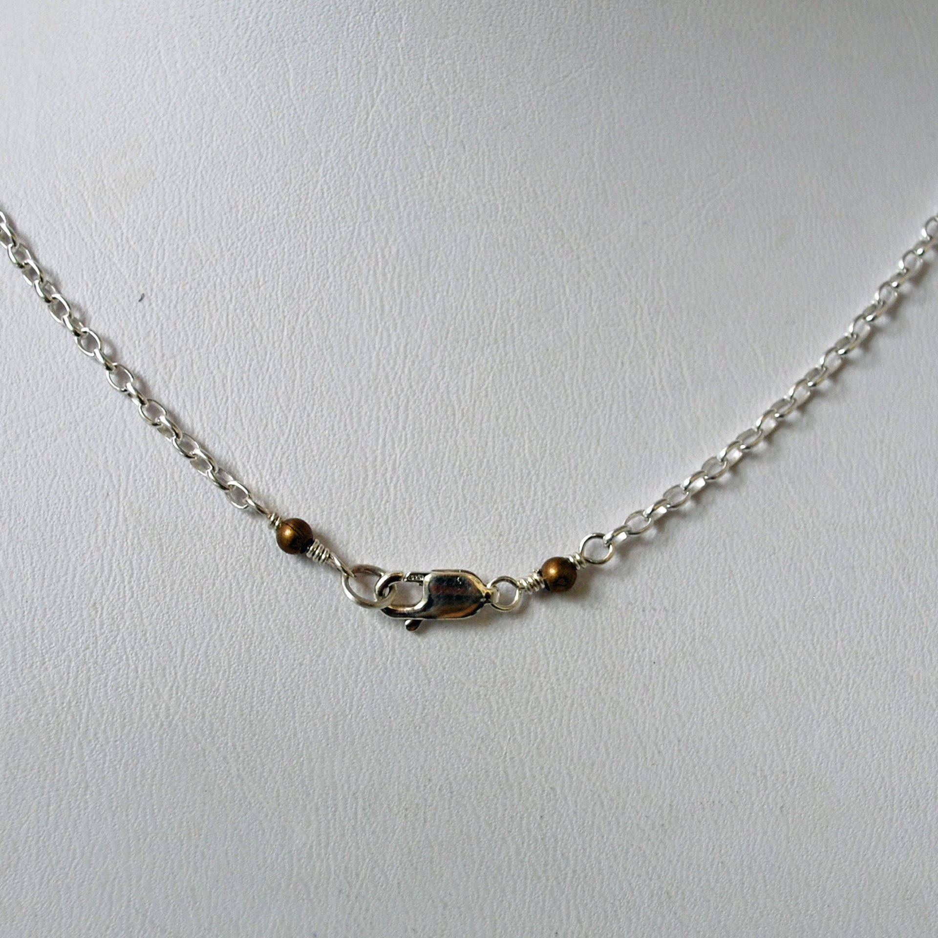Hammered Bronze Bar Necklace with Happy Silver Fish and Blue Topaz