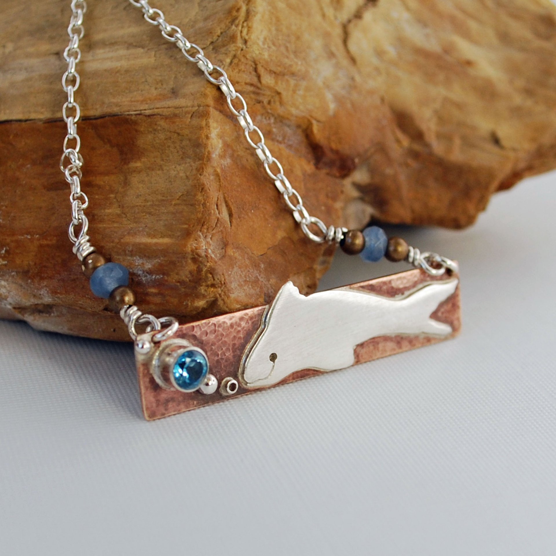 Hammered Bronze Bar Necklace with Happy Silver Fish and Blue Topaz