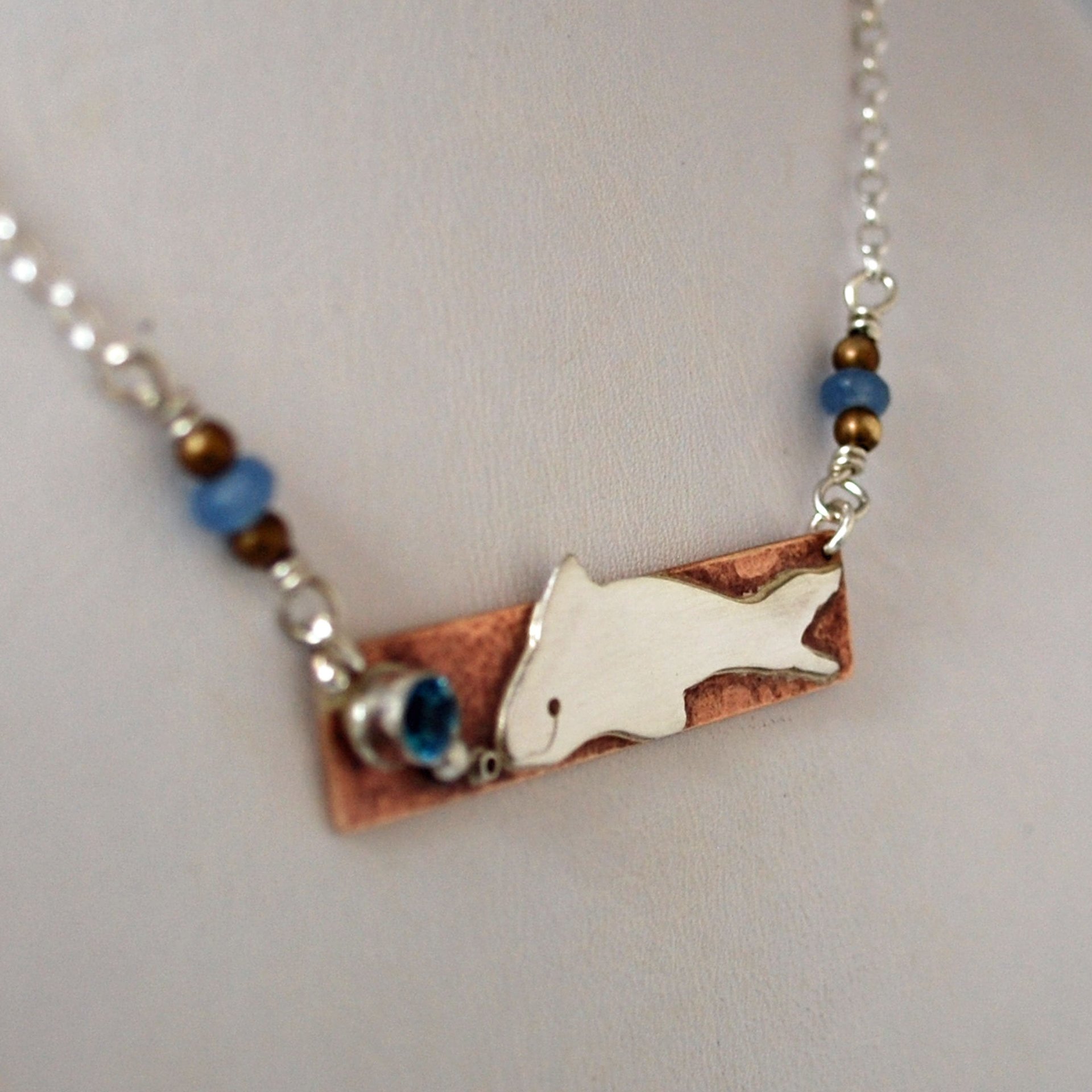 Hammered Bronze Bar Necklace with Happy Silver Fish and Blue Topaz