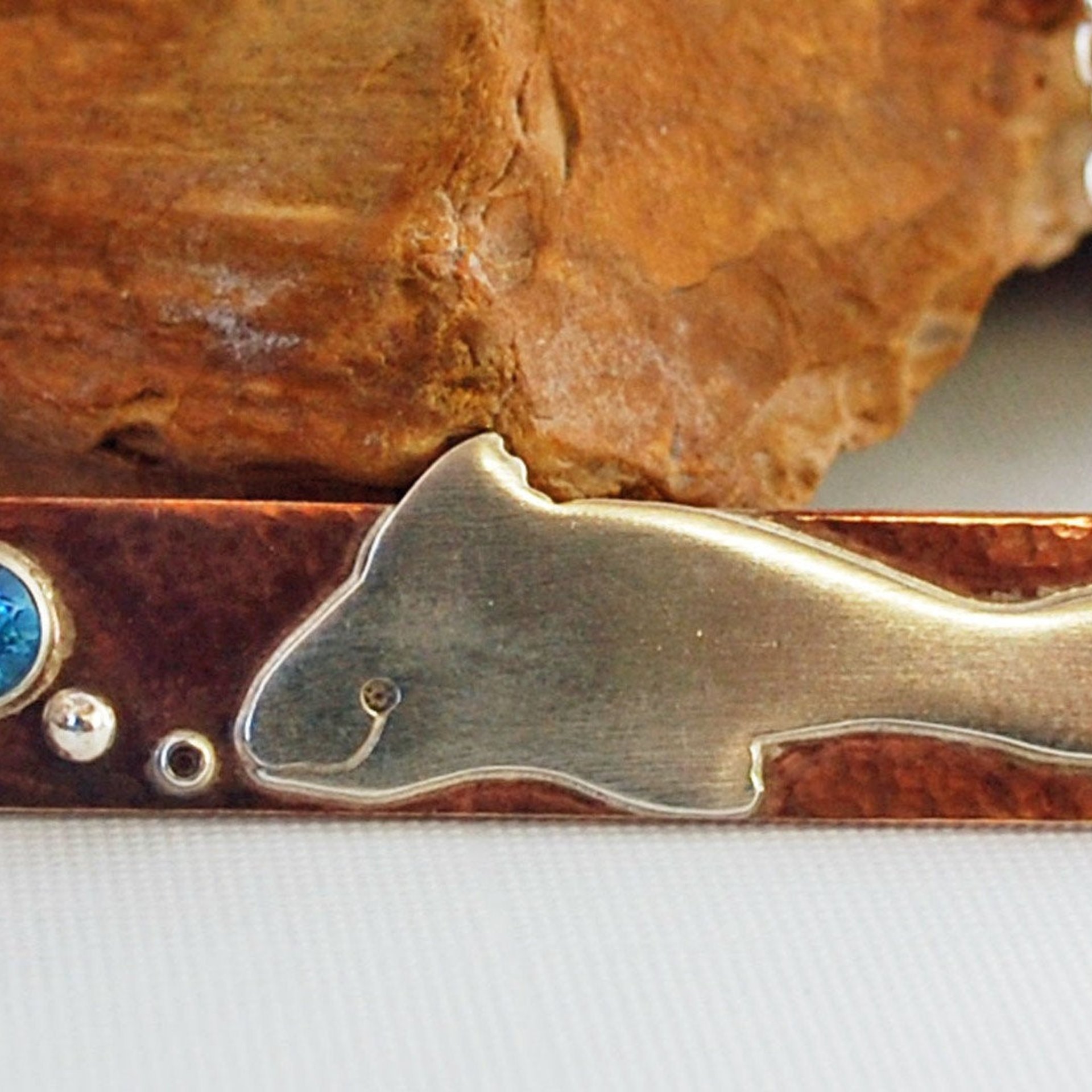 Hammered Bronze Bar Necklace with Happy Silver Fish and Blue Topaz