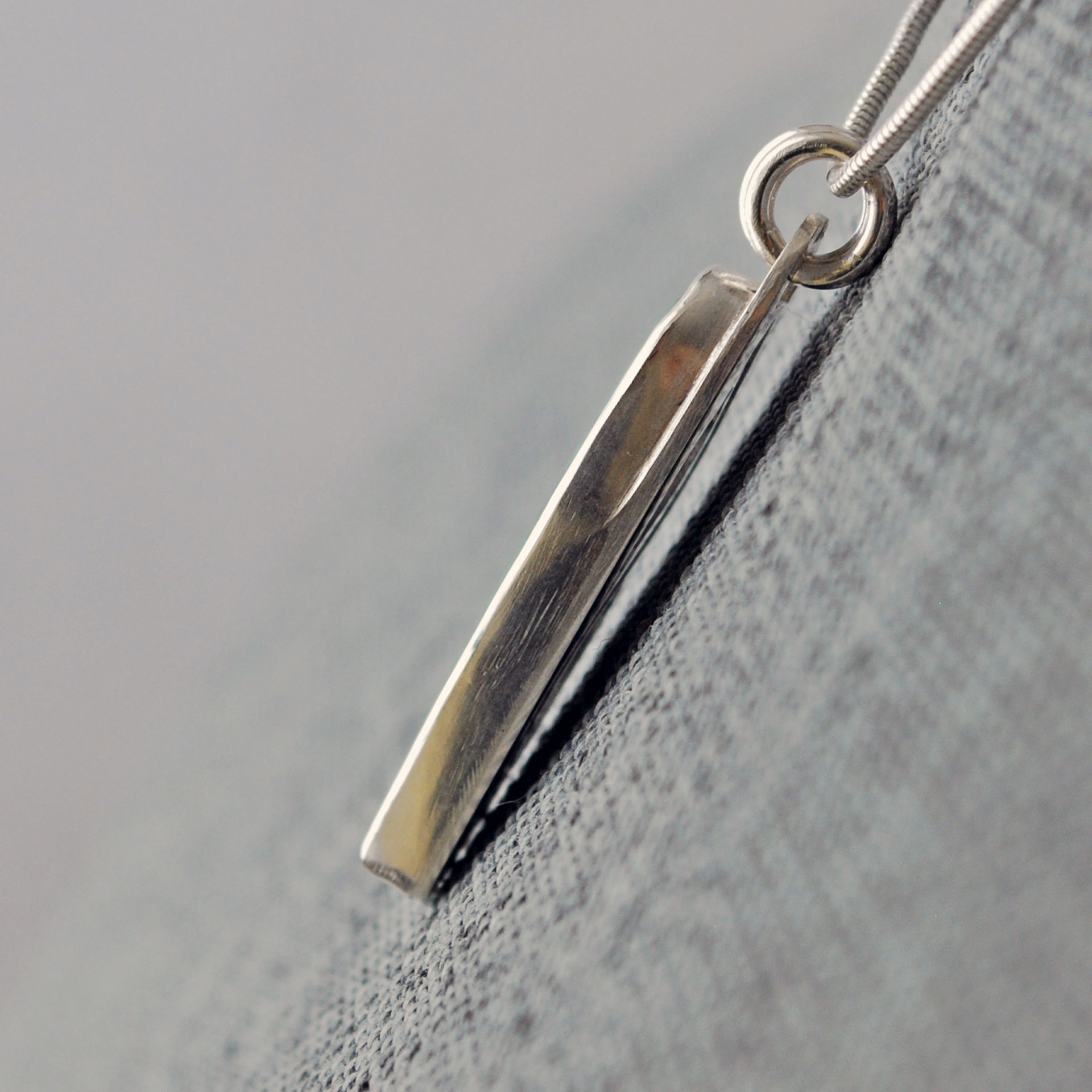 Silver Pendant with Maw Sit Sit