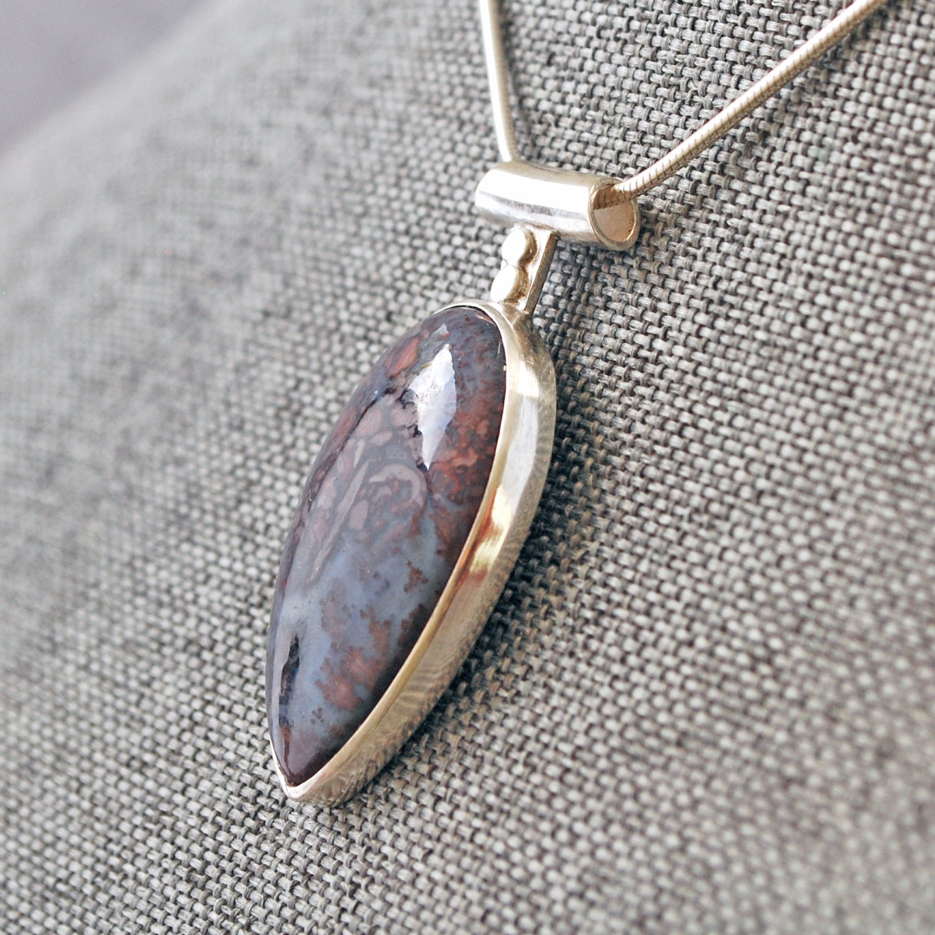 Agate Pendant with Rose Cut-Out in Back, angle