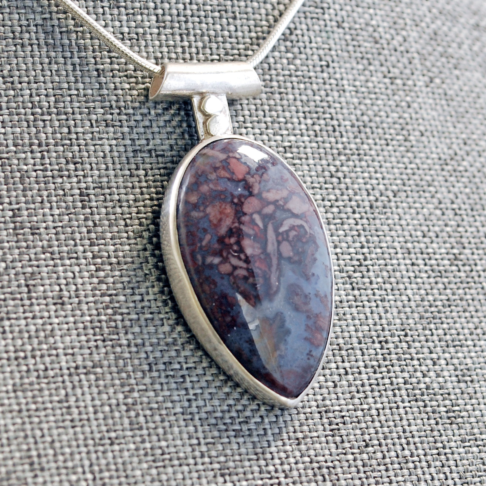 Agate Pendant with Rose Cut-Out in Back, angle