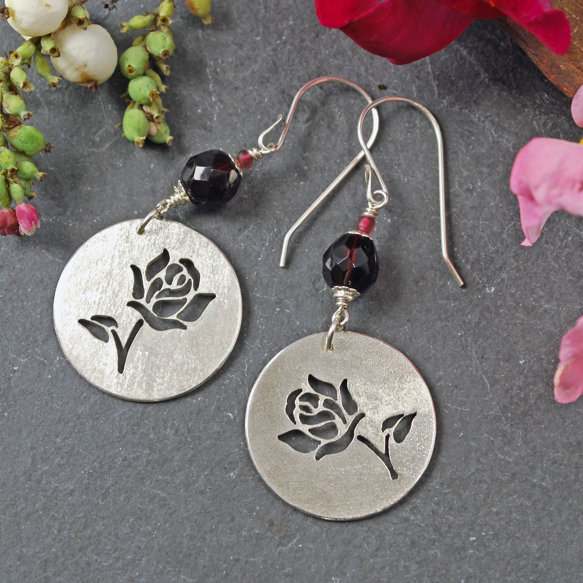 Silver Earrings with cut out roses, with Garnets