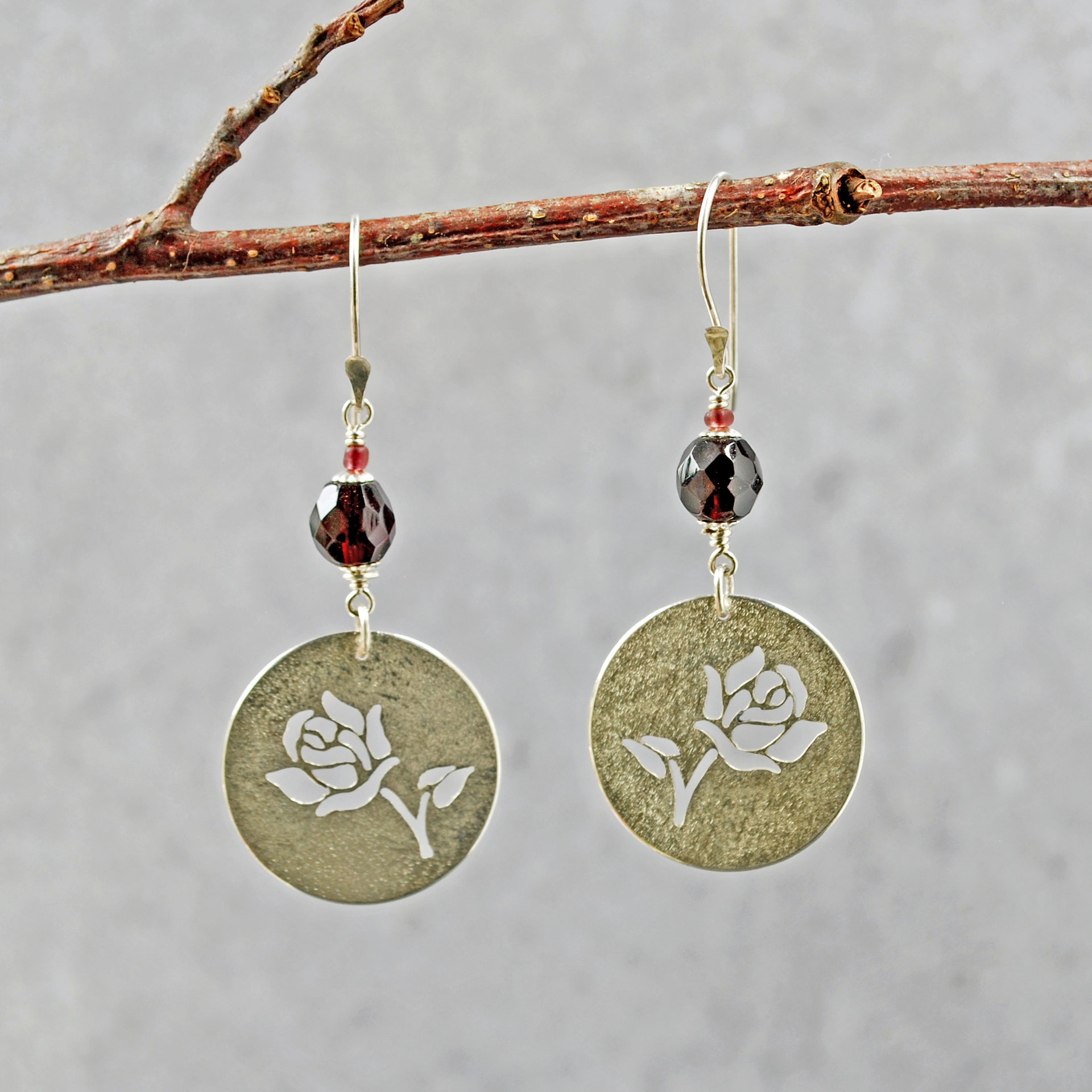Silver Rose cut-out garnet earrings, hanging