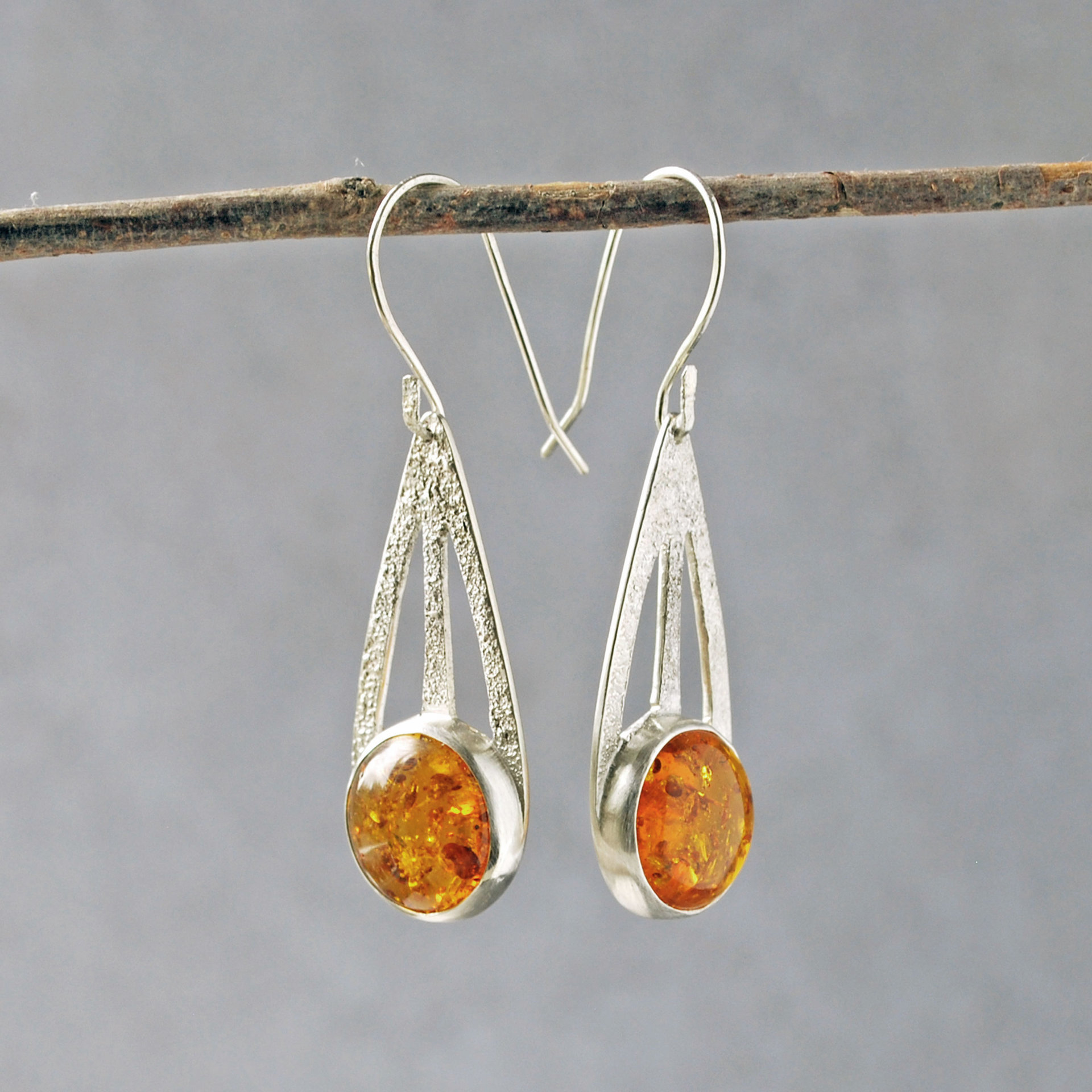 Baltic Amber Silver Drop Earrings hanging 