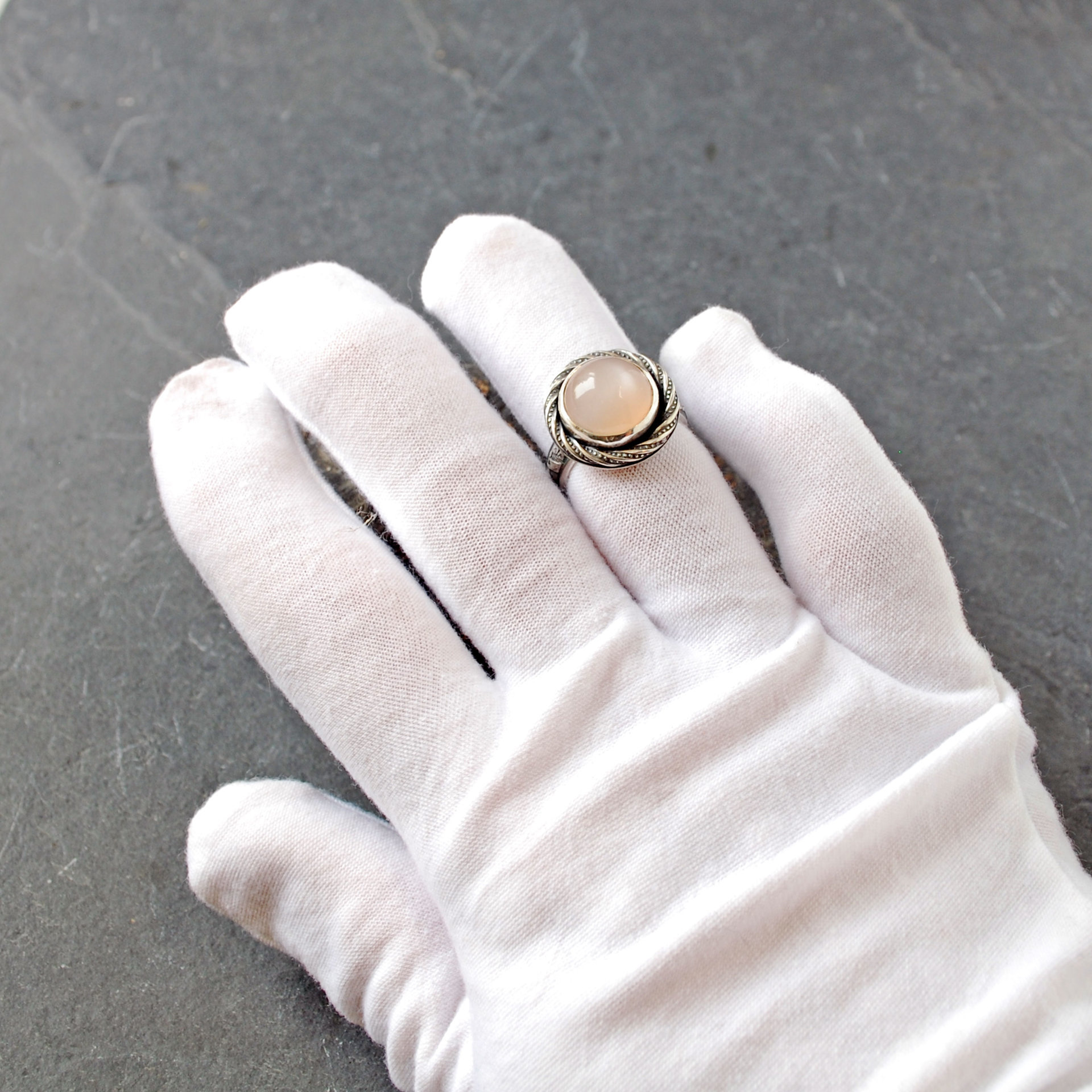 Peach Pink Moonstone silver ring on finger