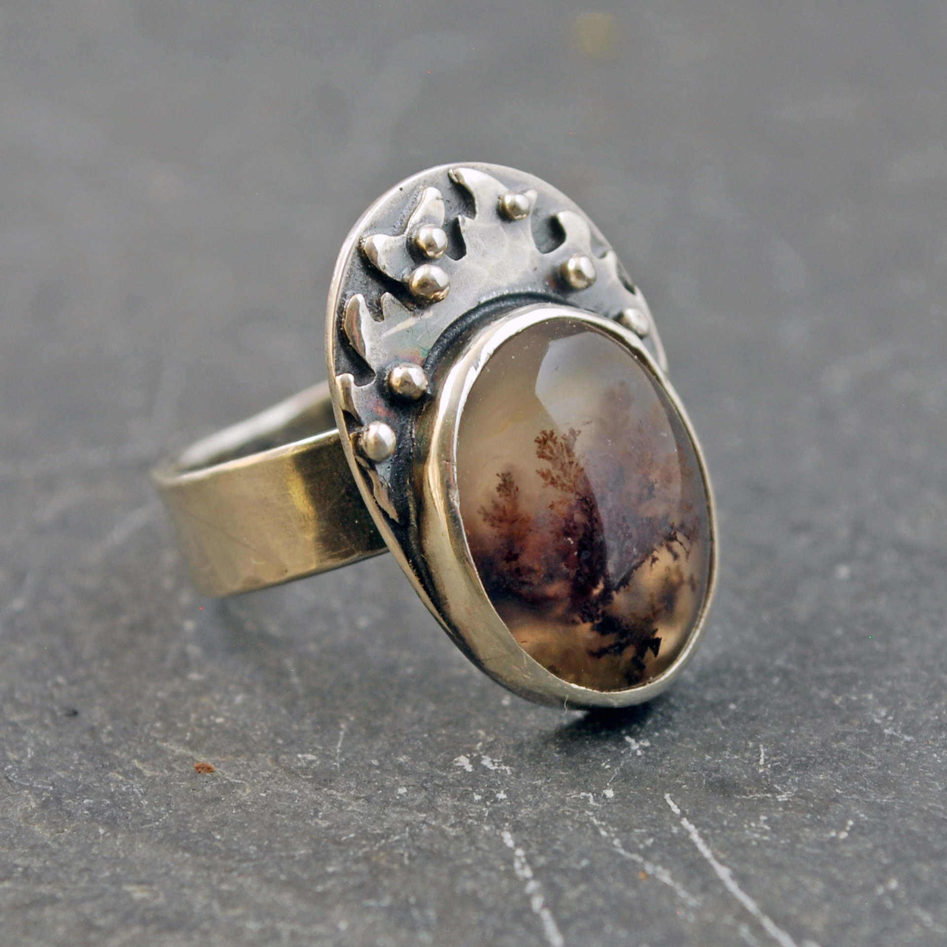 Moss agate silver ring, angle view