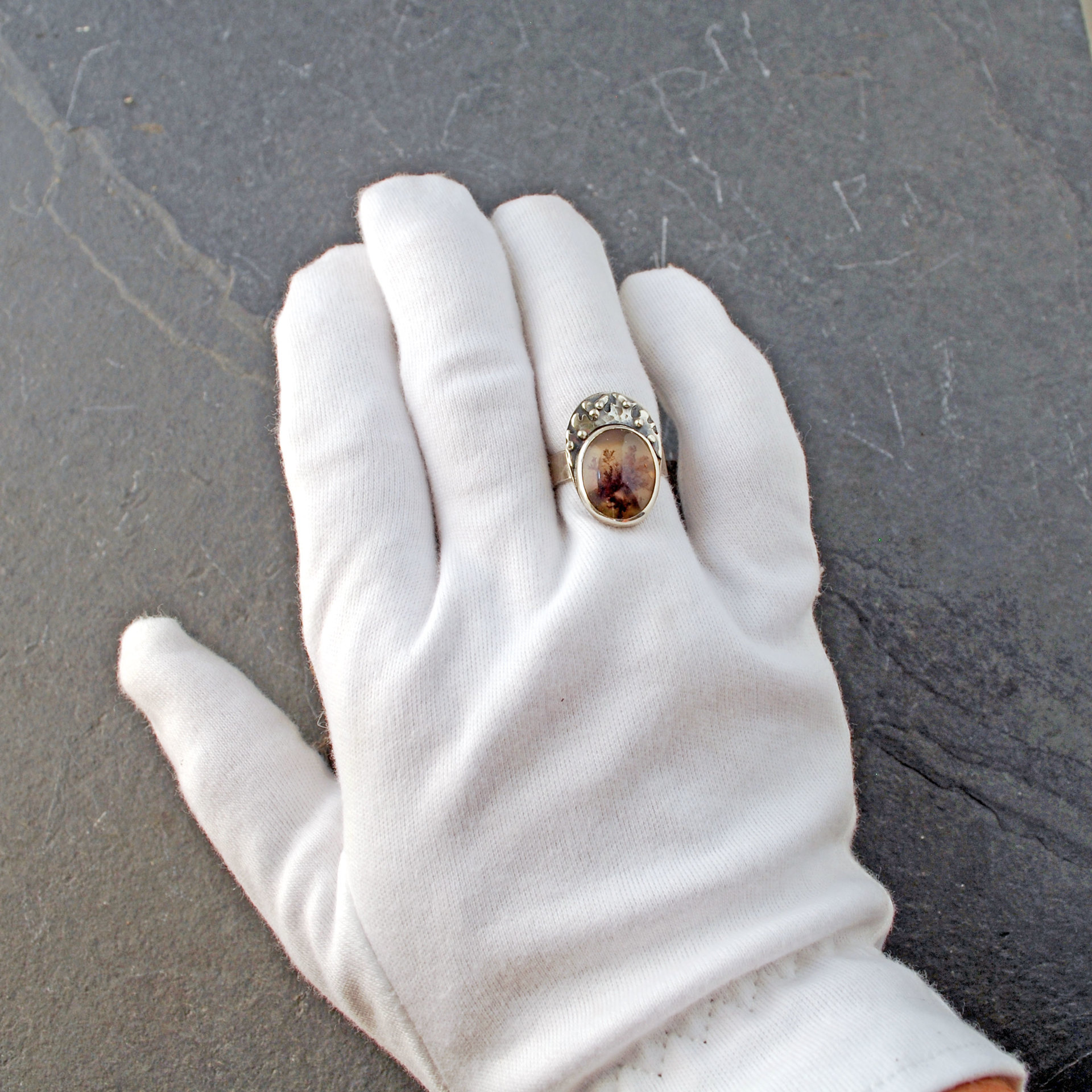 Moss agate silver ring, on finger