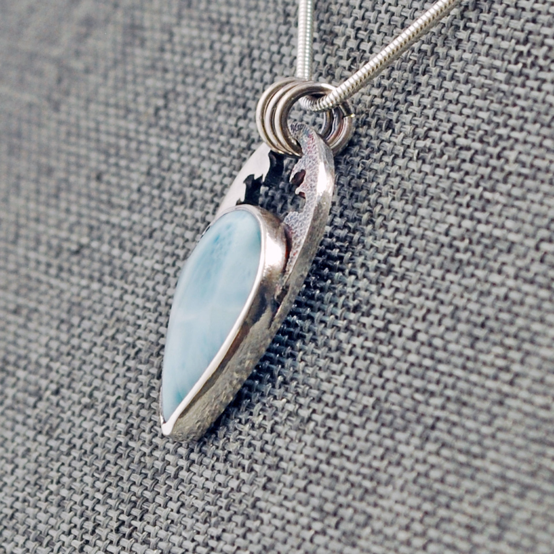 Larimar silver pendant angled view of other side