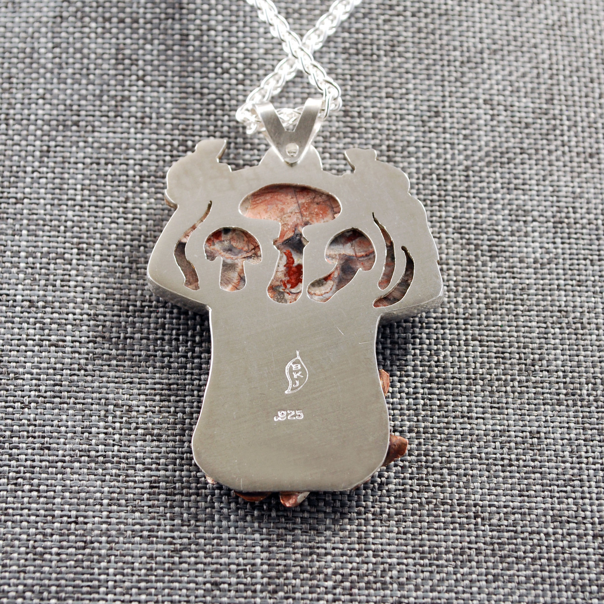 Mushroom pendant close-up of back