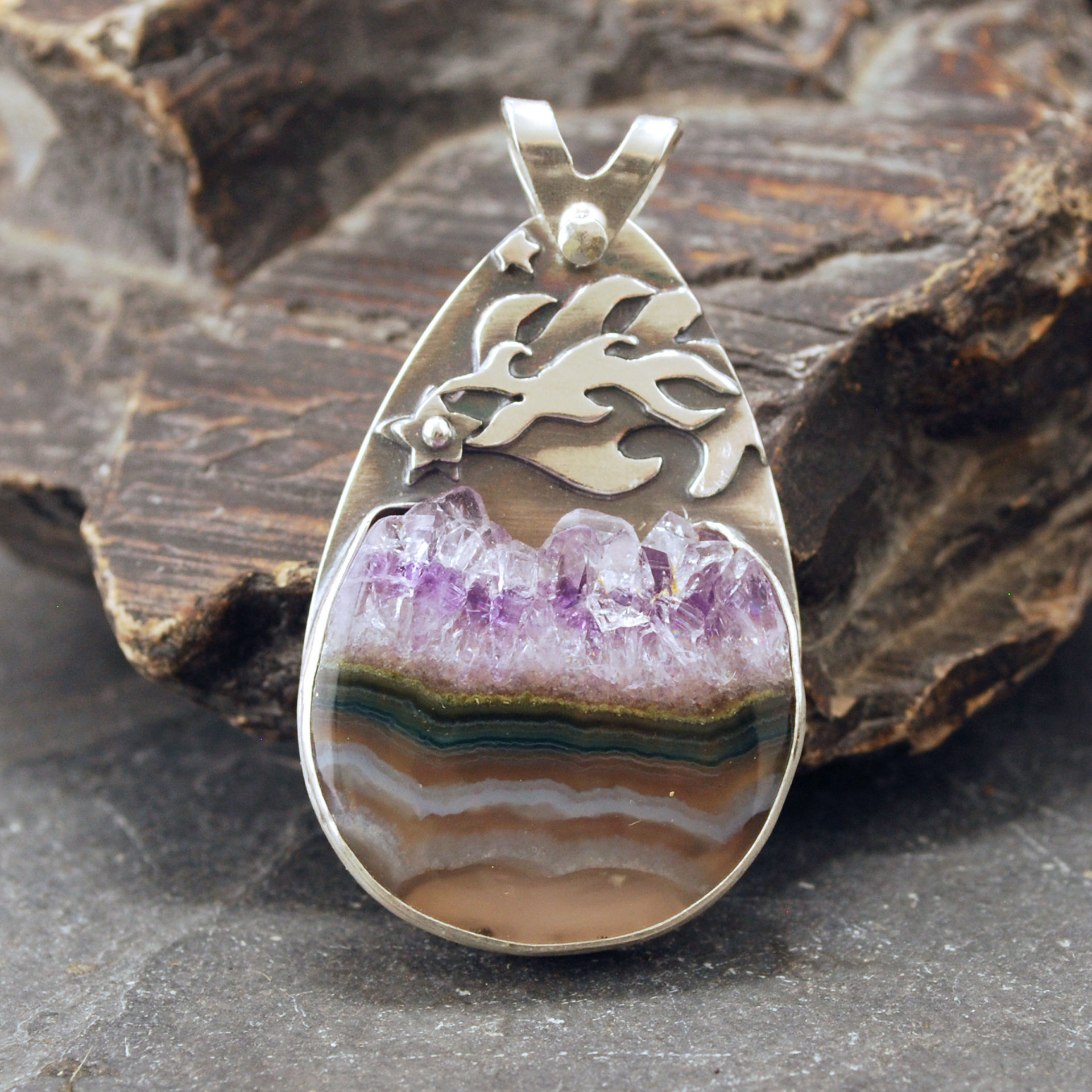 Silver pendant with Amethyst in Quartz cabochon, silver falling star above stone