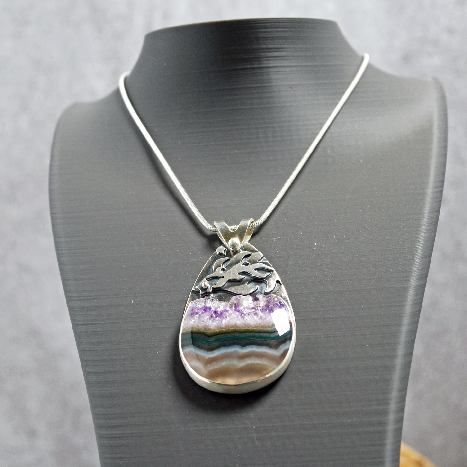 Silver pendant with Amethyst in Quartz cabochon, silver falling star above stone, hanging