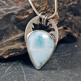 Larimar silver pendant with waves above stone
